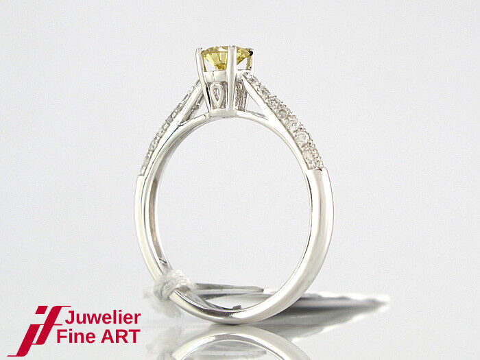 Ring 18K Gold 1 Brillant yel. 0,30 ct + 24 Brillanten ca. 0,21 ct - 2,4g Gr. 53