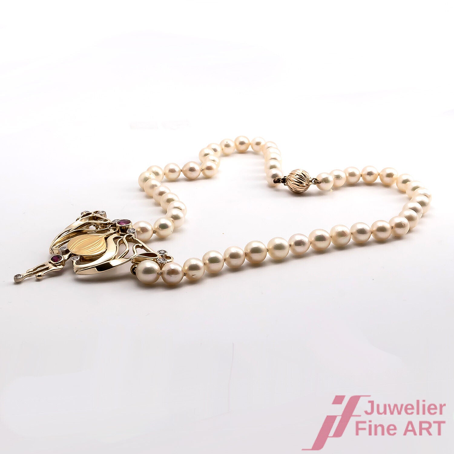 Perlencollier mit handgearbeitetem Mittelteil aus 14K GG/Wg Akoya/Rubine/Brill.