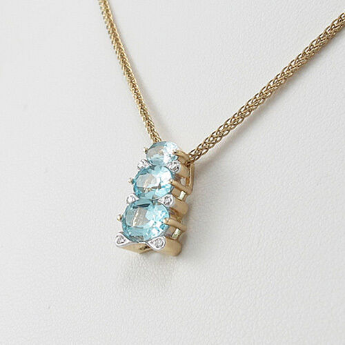 Anhänger/Kette 3 Aquamarine ca.1,45ct + 6 Diamanten ca.0,06ct 585/14K Gelbgold