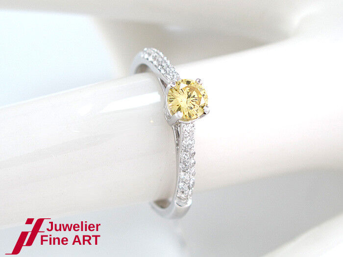 Ring 18K Gold 1 Brillant yel. 0,30 ct + 24 Brillanten ca. 0,21 ct - 2,4g Gr. 53