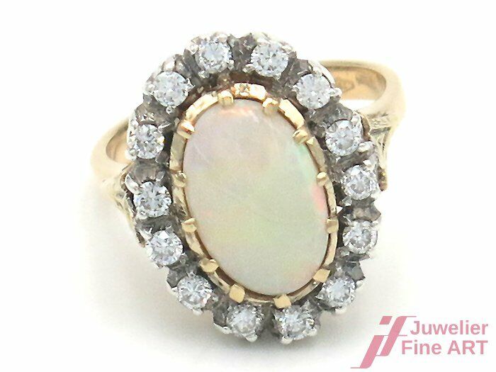 Ring 18K GG/WG - 1 Opal Cab. + 14 Diam. zus. ca. 0,70 ct TW/si - 8,5 g - Gr. 55