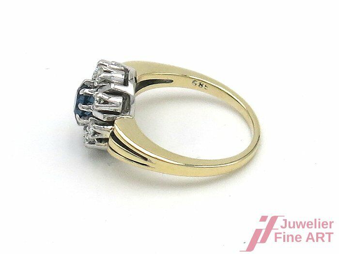 Ring 14K/585 GG/WG - 1 Saphir 0,60 ct + 8 Brill. 0,40 ct /W/si - 7,2 g - Gr. 56