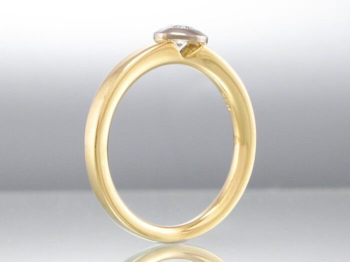 Solitär-Ring - 750/18K Gelb- & Weißgold - Brillant 0,20 ct TW/SI - 4,3g- Gr.53,5