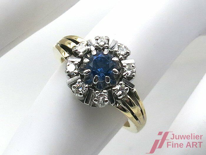 Ring 14K/585 GG/WG - 1 Saphir 0,60 ct + 8 Brill. 0,40 ct /W/si - 7,2 g - Gr. 56