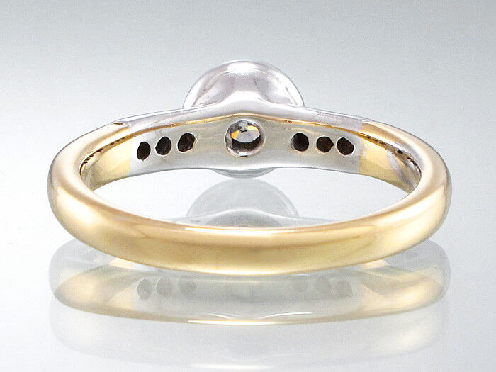 SOLITÄR-RING in 750/18K Gold - 7 Brillanten zus.ca. 0,36 ct - 5,3 g - Gr. 56